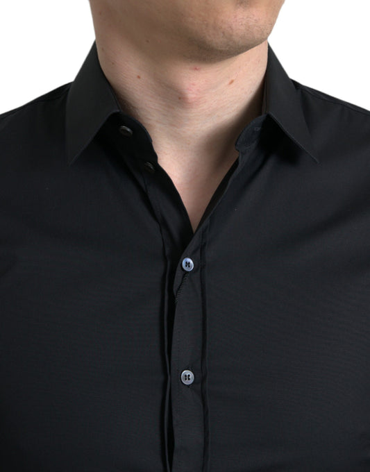 Man wearing black shirt with collar