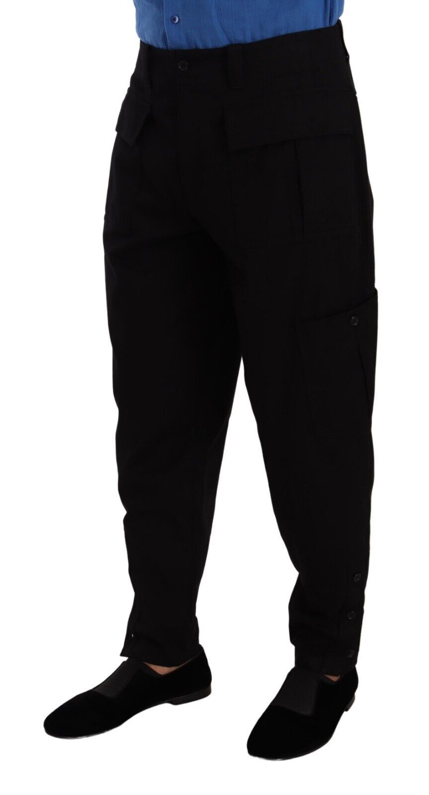 Man wearing black pants and blue shirt