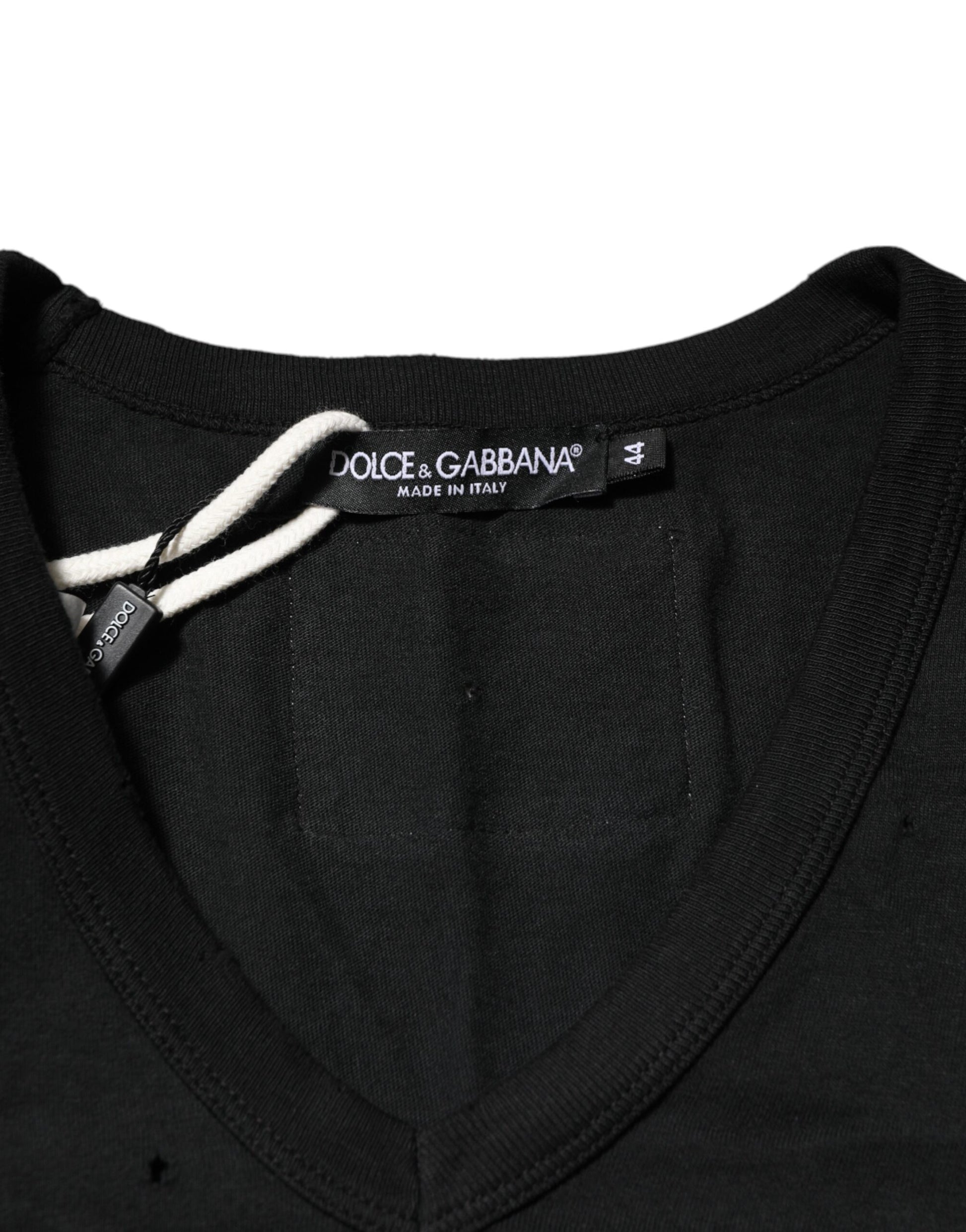 Black sweater with white stripes on sleeves