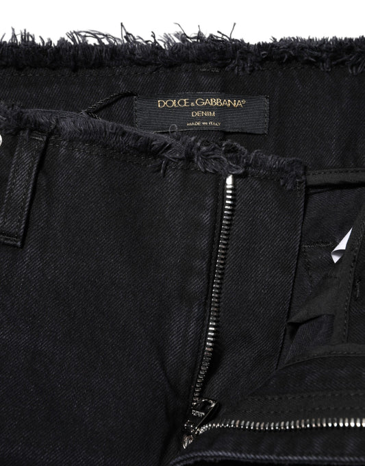 Pair of distressed jeans with zipper details