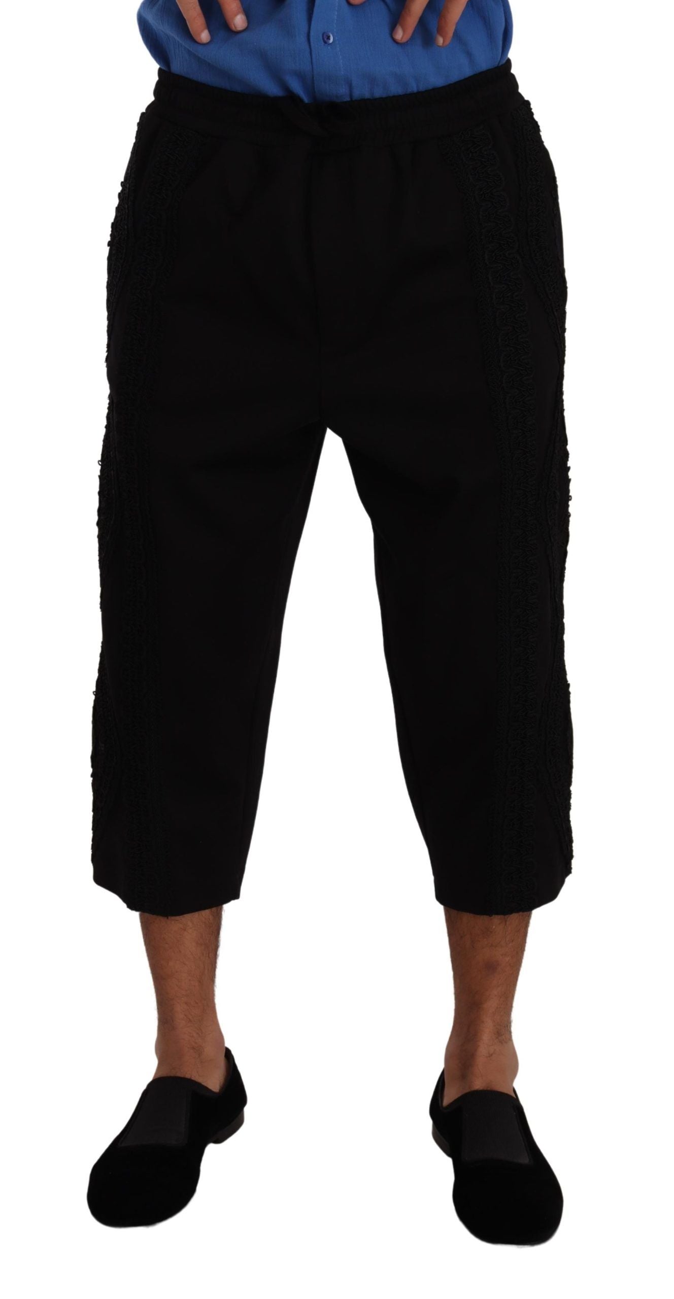 Man wearing black pants and shoes