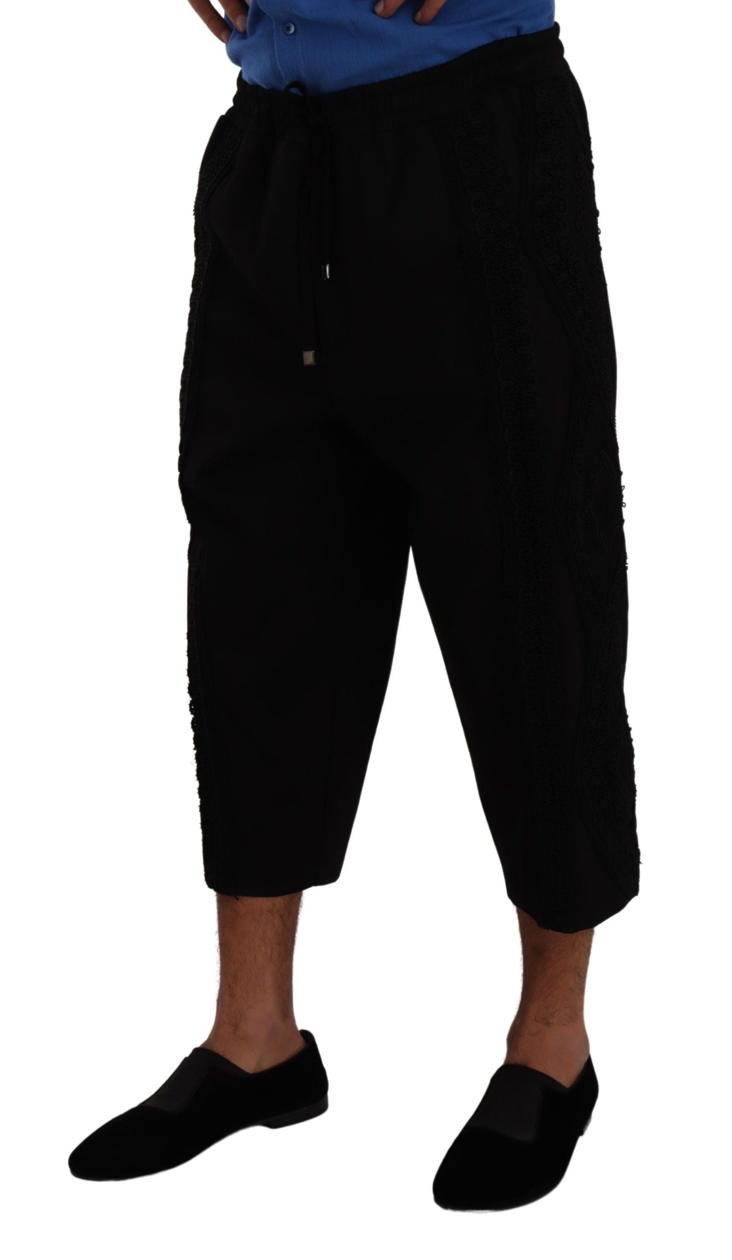 Man wearing black pants and shoes