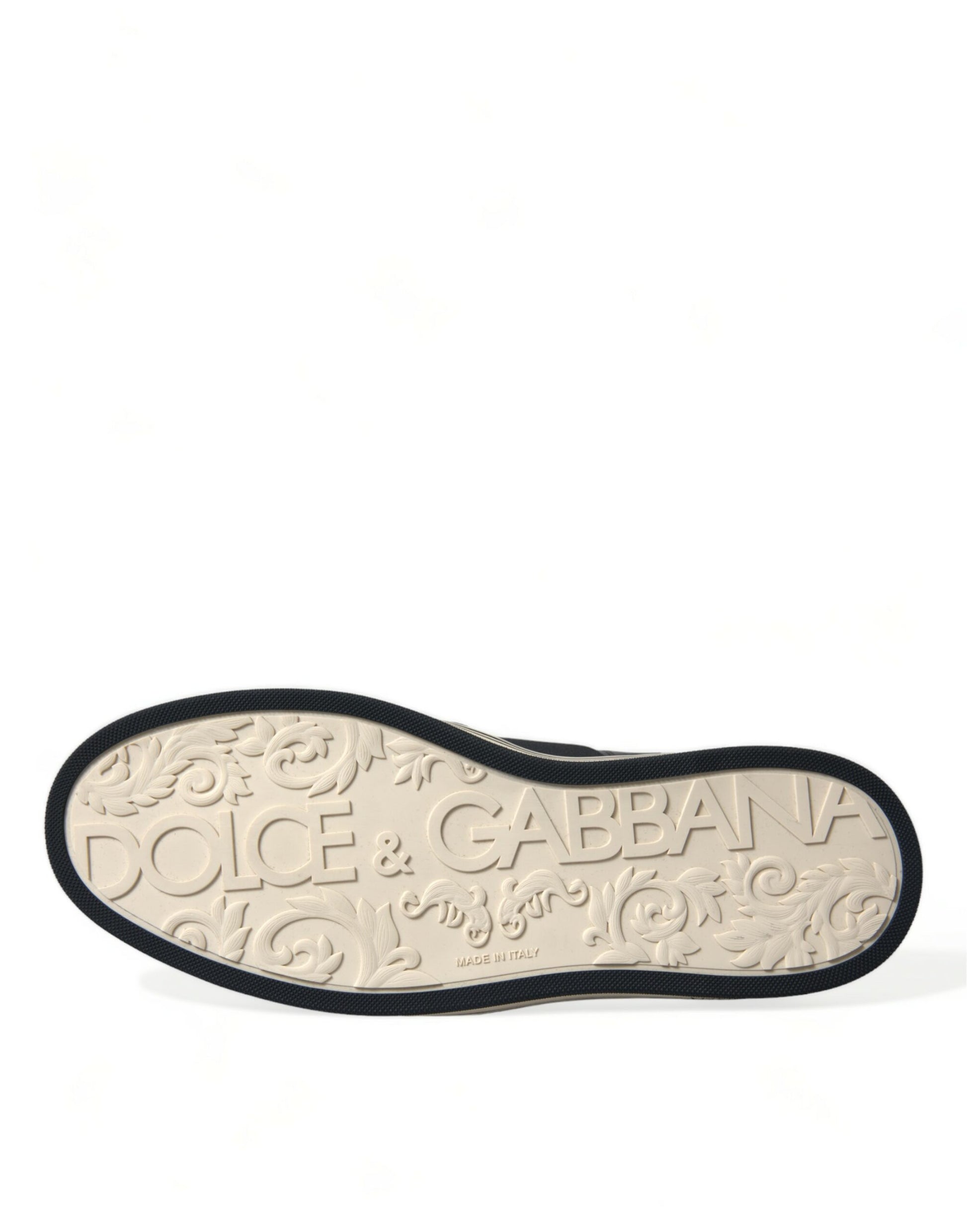 Black and white shoe with embossed logo