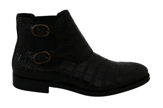 Black leather boot with buckle straps and a chunky heel
