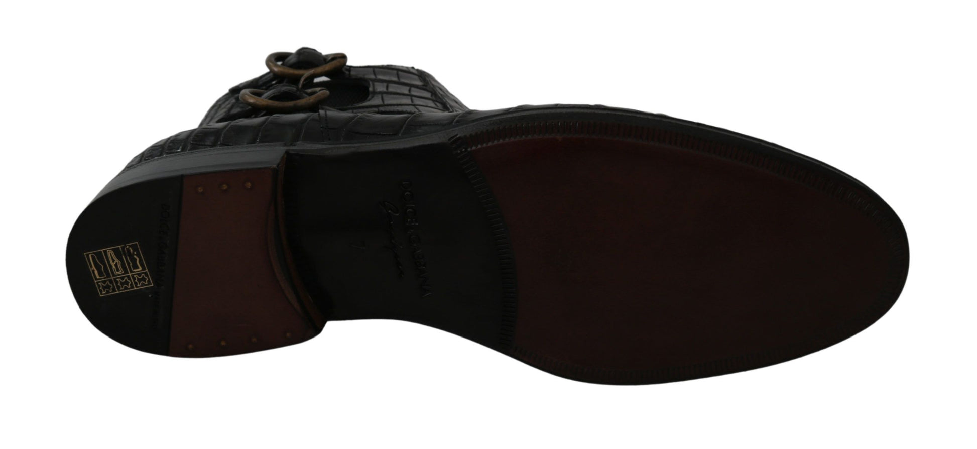Brown shoe with laces and a logo on the side
