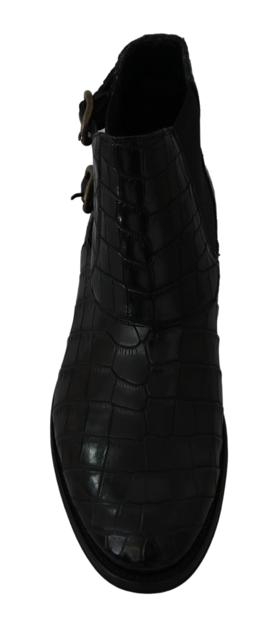 Black leather shoe with a strap and buckle closure