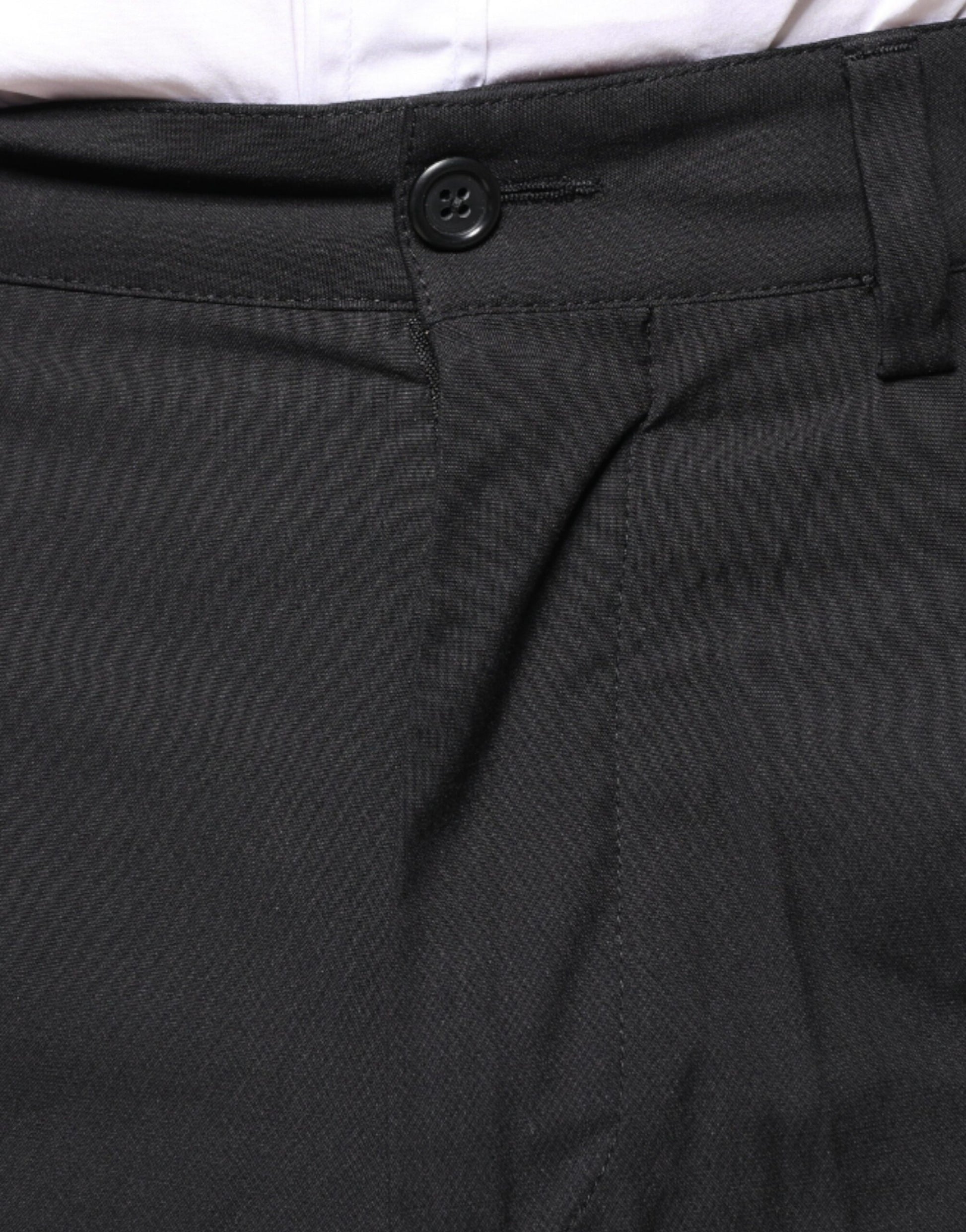 A pair of black dress pants with a button closure at the waist