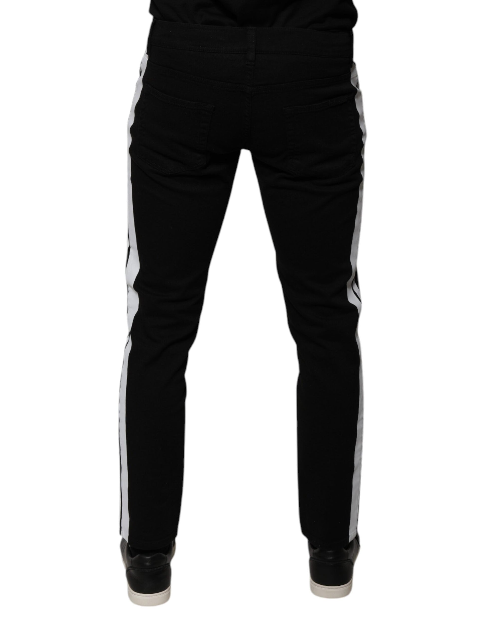 Pair of black pants with white stripes down sides