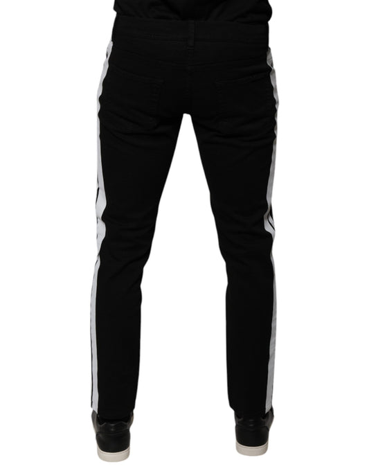 Pair of black pants with white stripes down sides