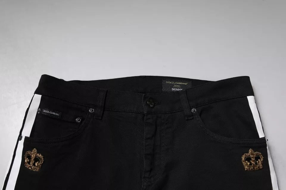 Pair of black jeans with gold embroidery on front pockets