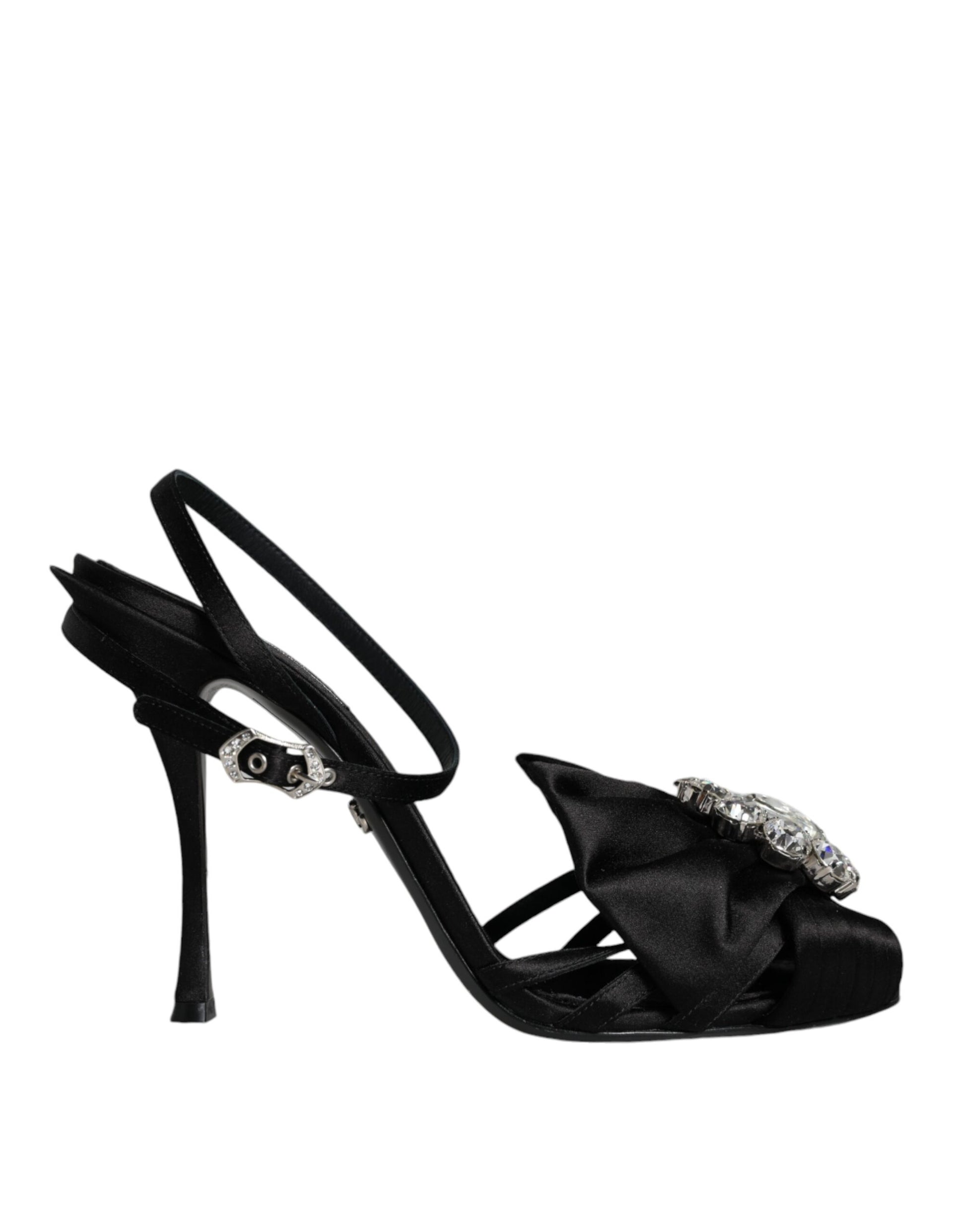 Black high heel shoe with ruffled detailing on toe