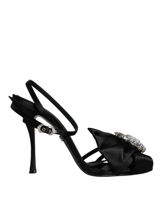 Black high heel shoe with ruffled detailing on toe