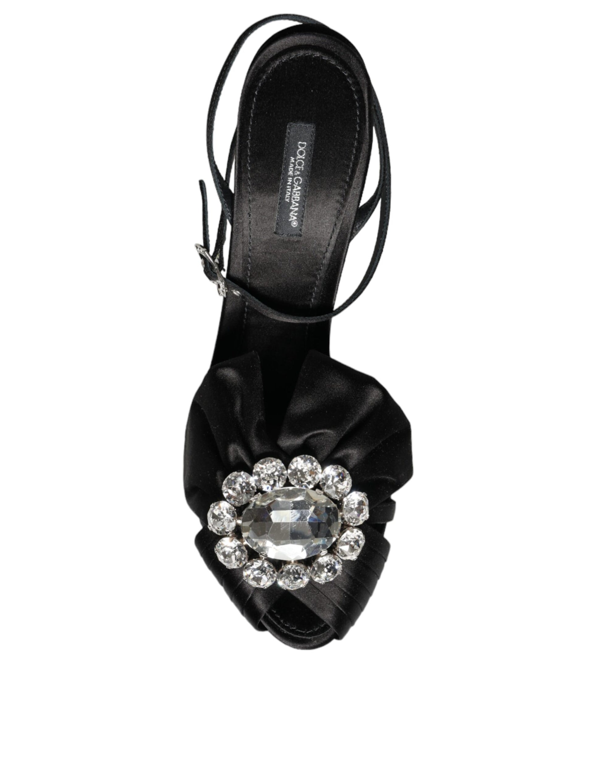 Black high heel shoe with rhinestone embellishment on toe