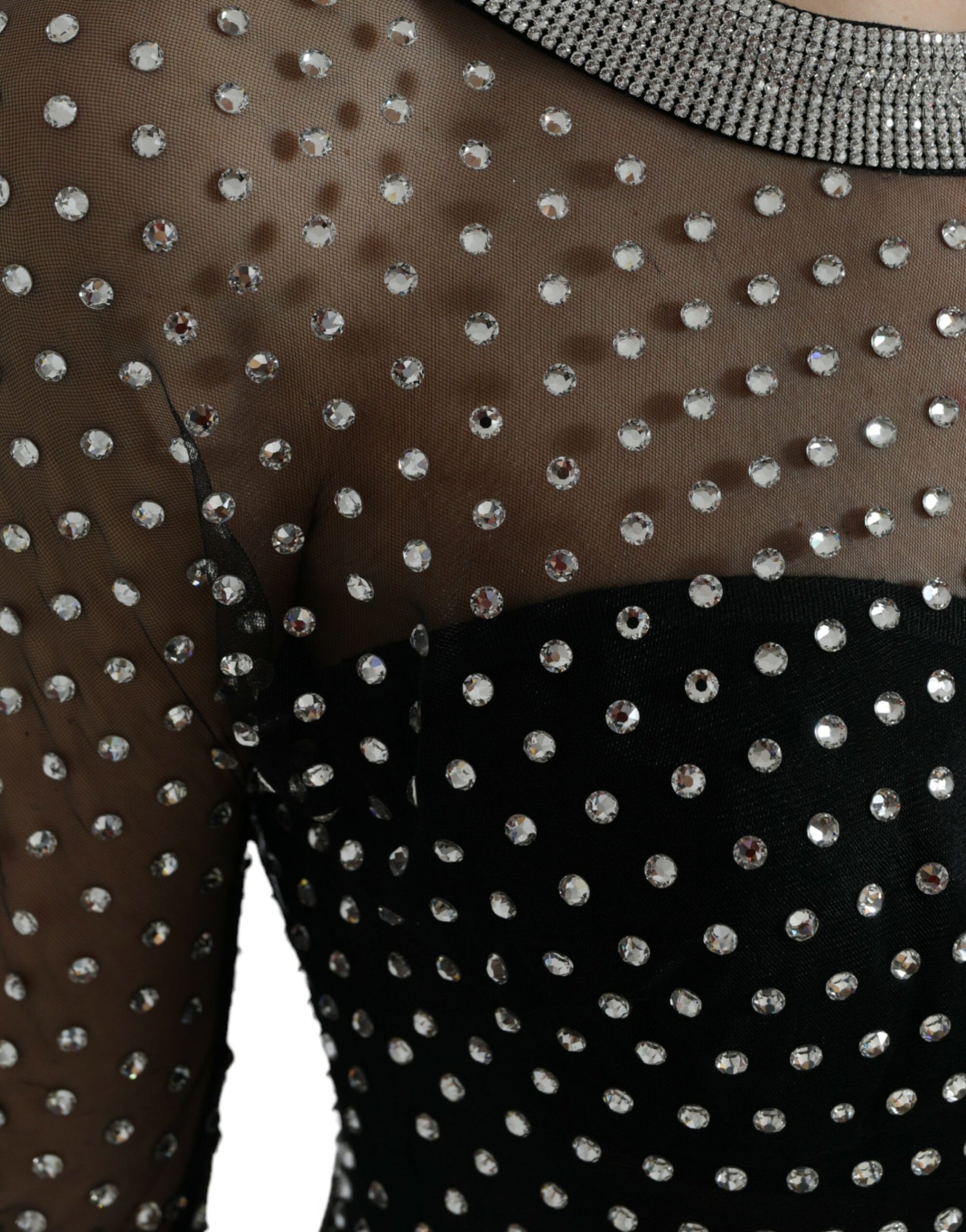 A black dress with crystal embellishments on the bodice