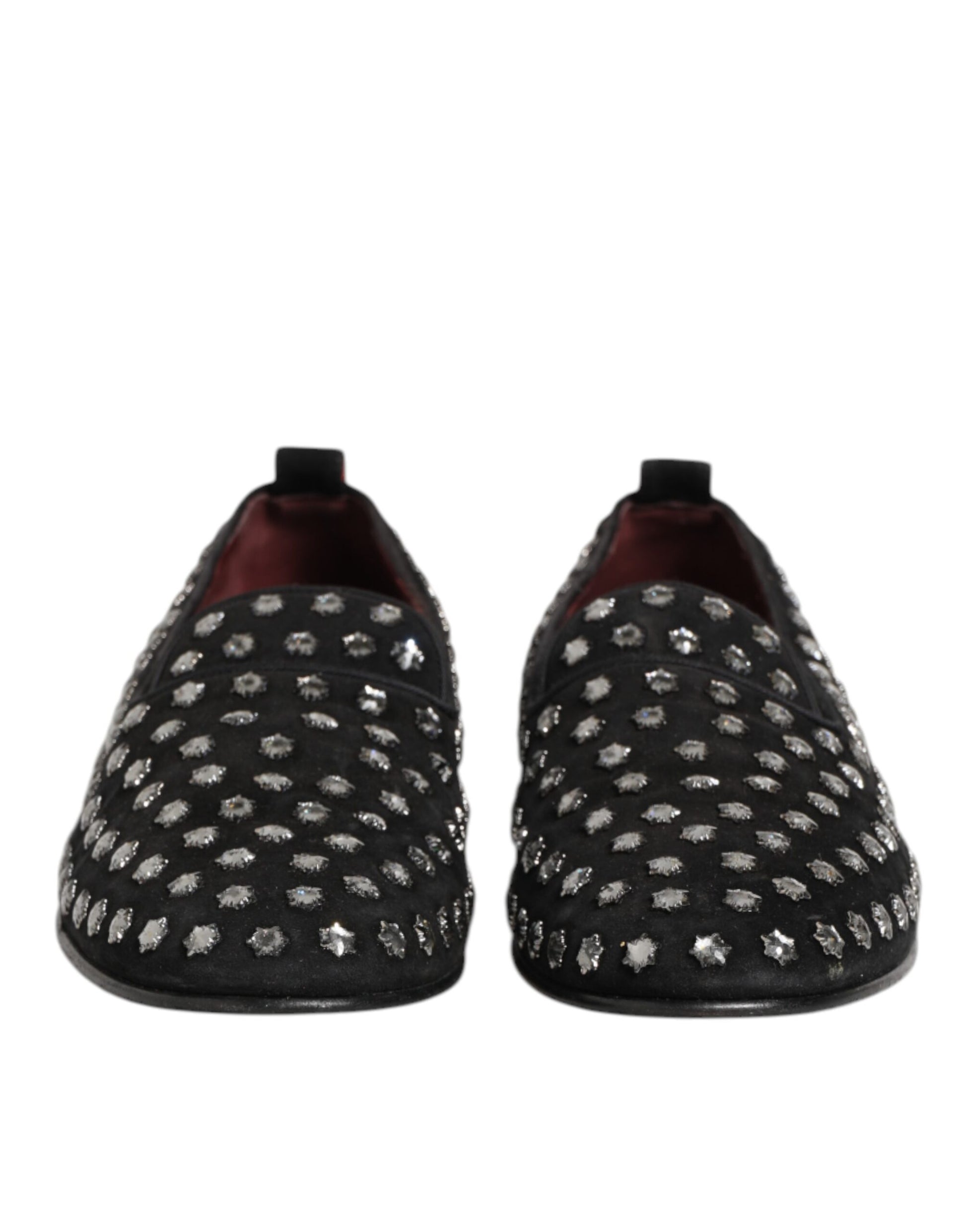 Pair of black loafers with crystal embellishments, featuring a round toe and elastic panels for comfort
