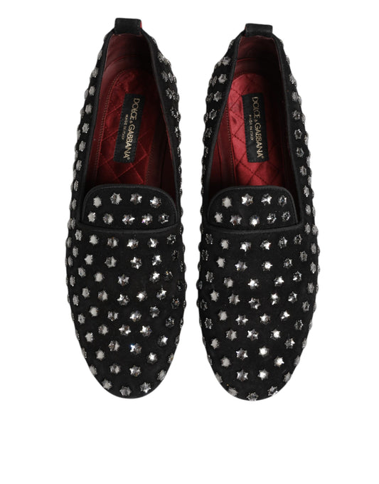 Pair of black loafers with crystal embellishments, featuring a red interior and a bow on the side