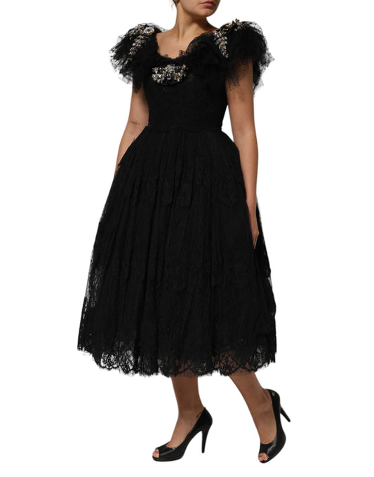Black midi dress with crystal embellishments and lace detailing