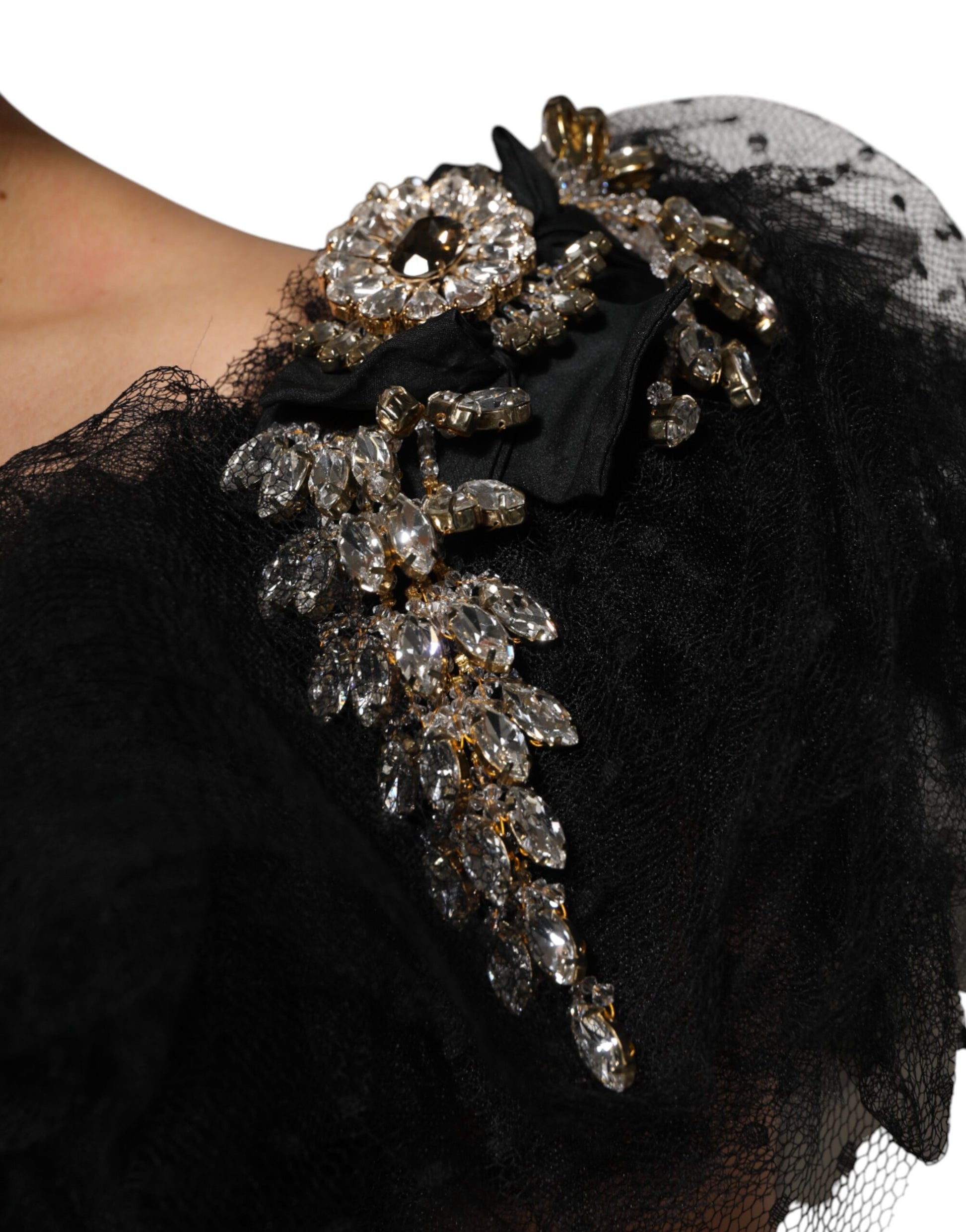 Black midi dress with crystal embellishments on shoulders and bodice