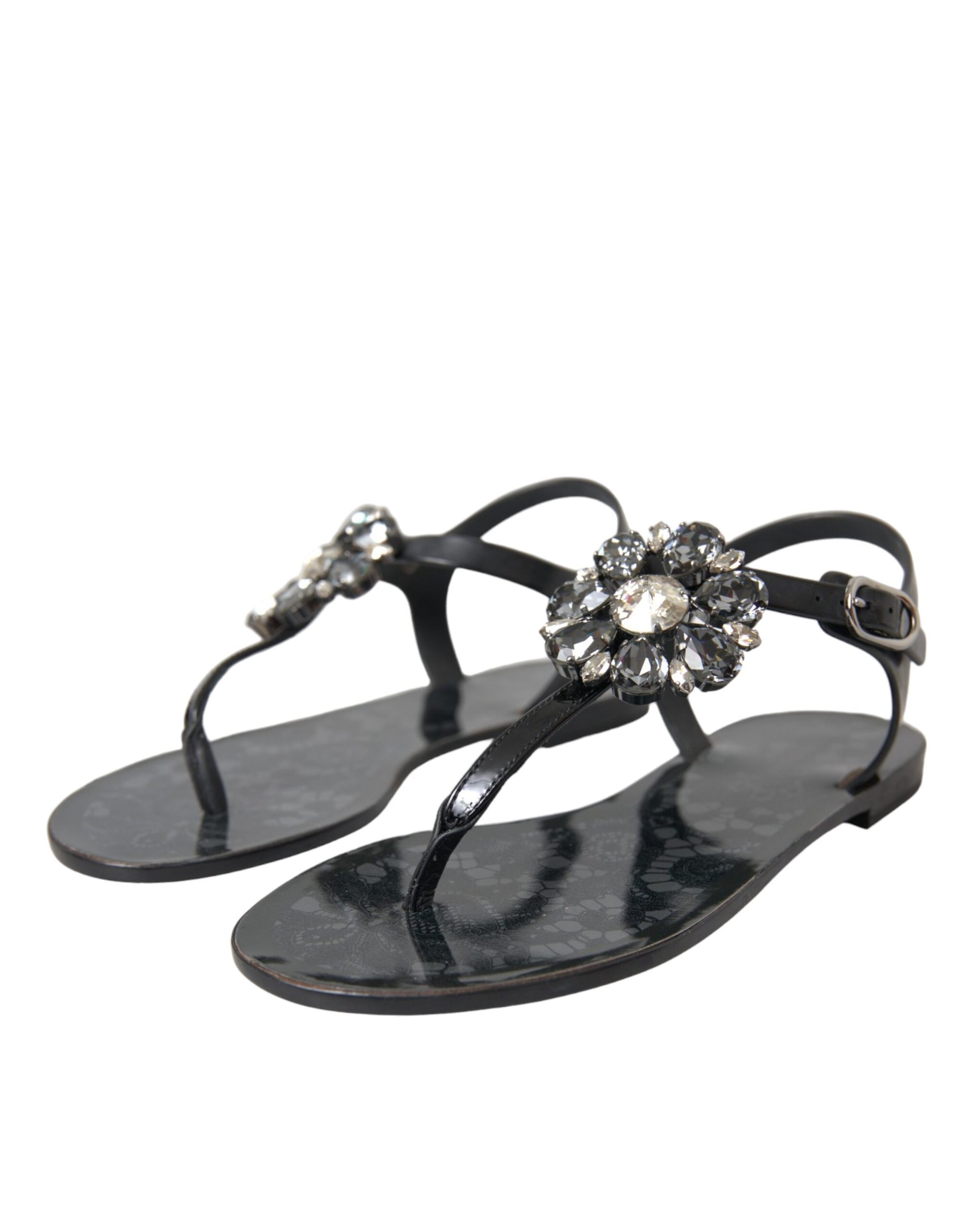 Black sandals with decorative stones on straps