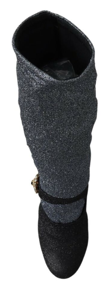 Black glittery boots with a round toe and high heel