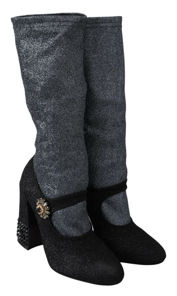 Pair of glittery boots with heels and straps