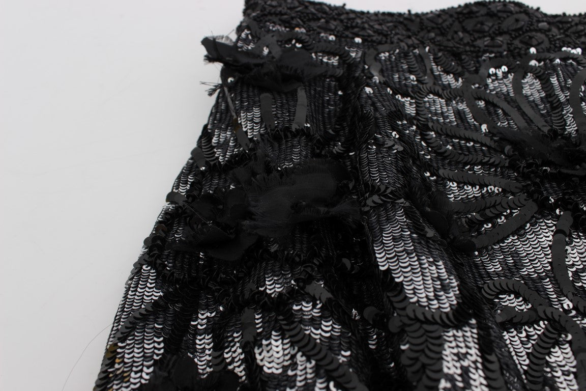 Black lace fabric on white background