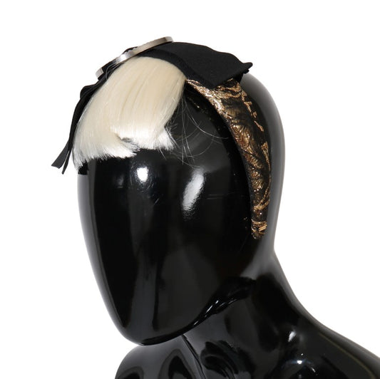 Headless mannequin wearing a black and gold headband