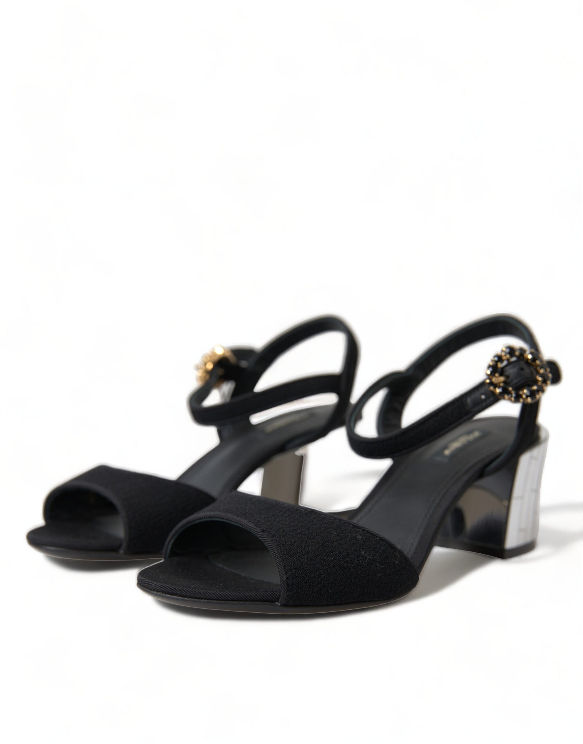 Black high heel sandals with embellishments on straps and toe cap
