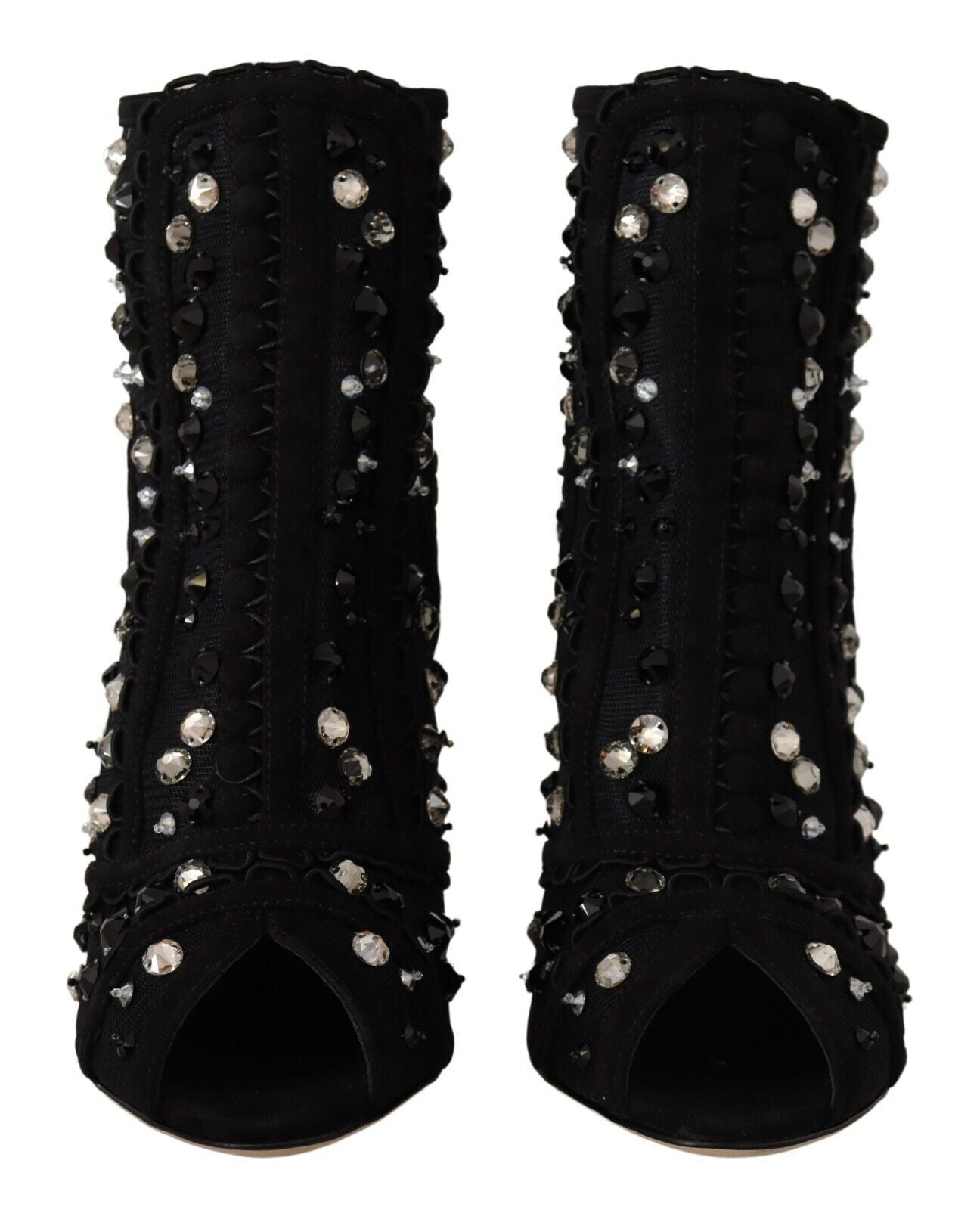 Pair of black high heel shoes with studded detailing and a pointed toe design
