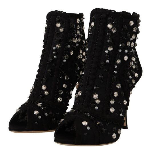Black boots with silver studs and embroidery