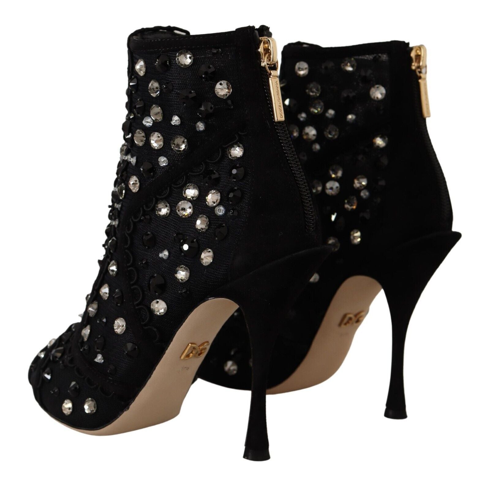 Black high heel shoes with gold accents and sparkles on top