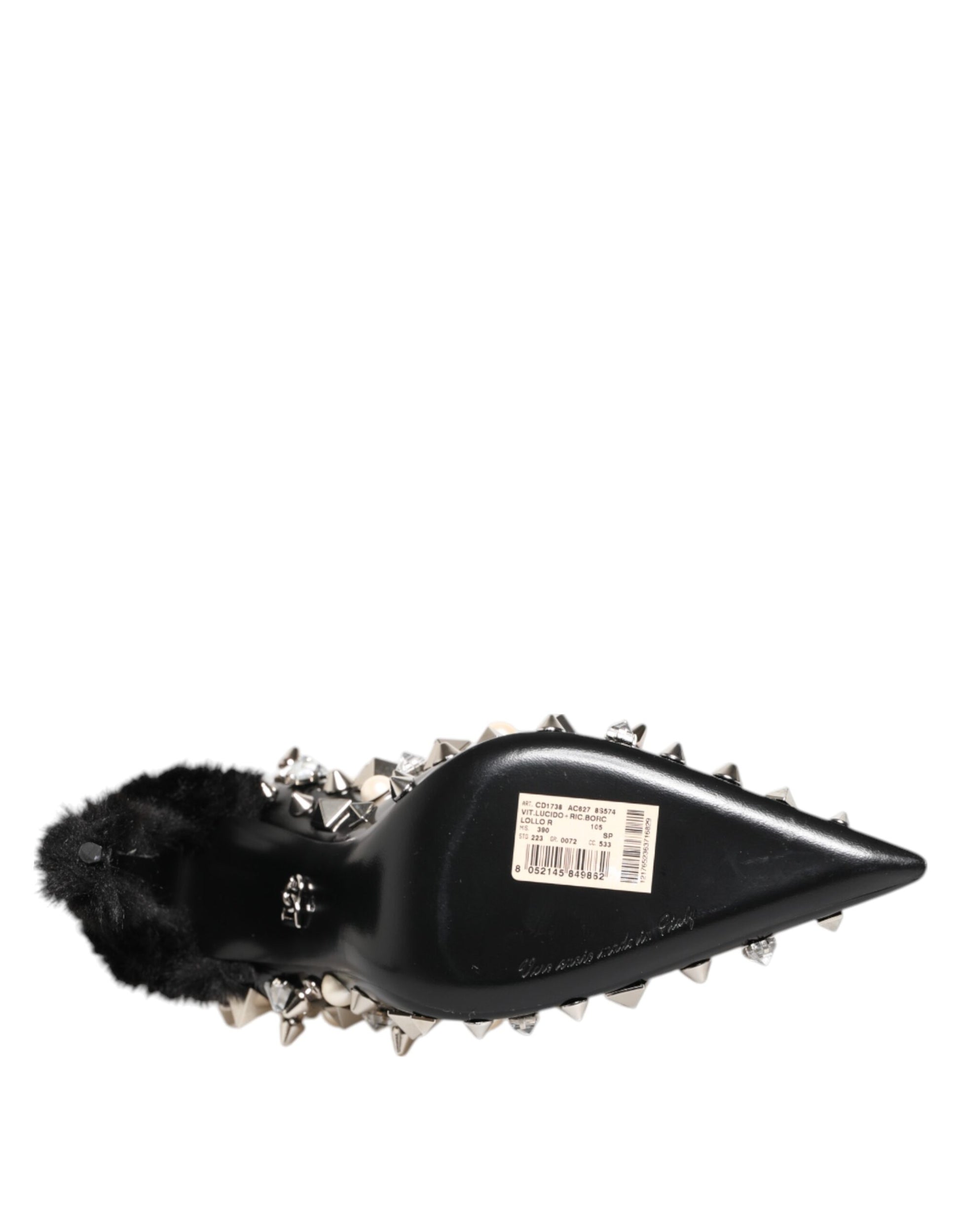 Black high heel shoe with fur trim and spiky studs