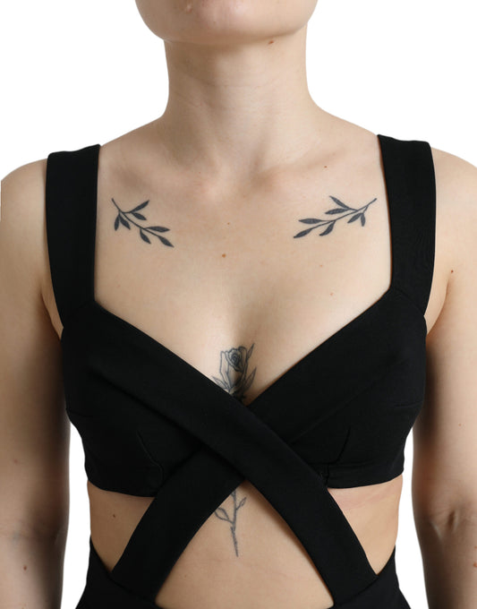 A black cut out sleeveless bodycon midi dress with a high neckline