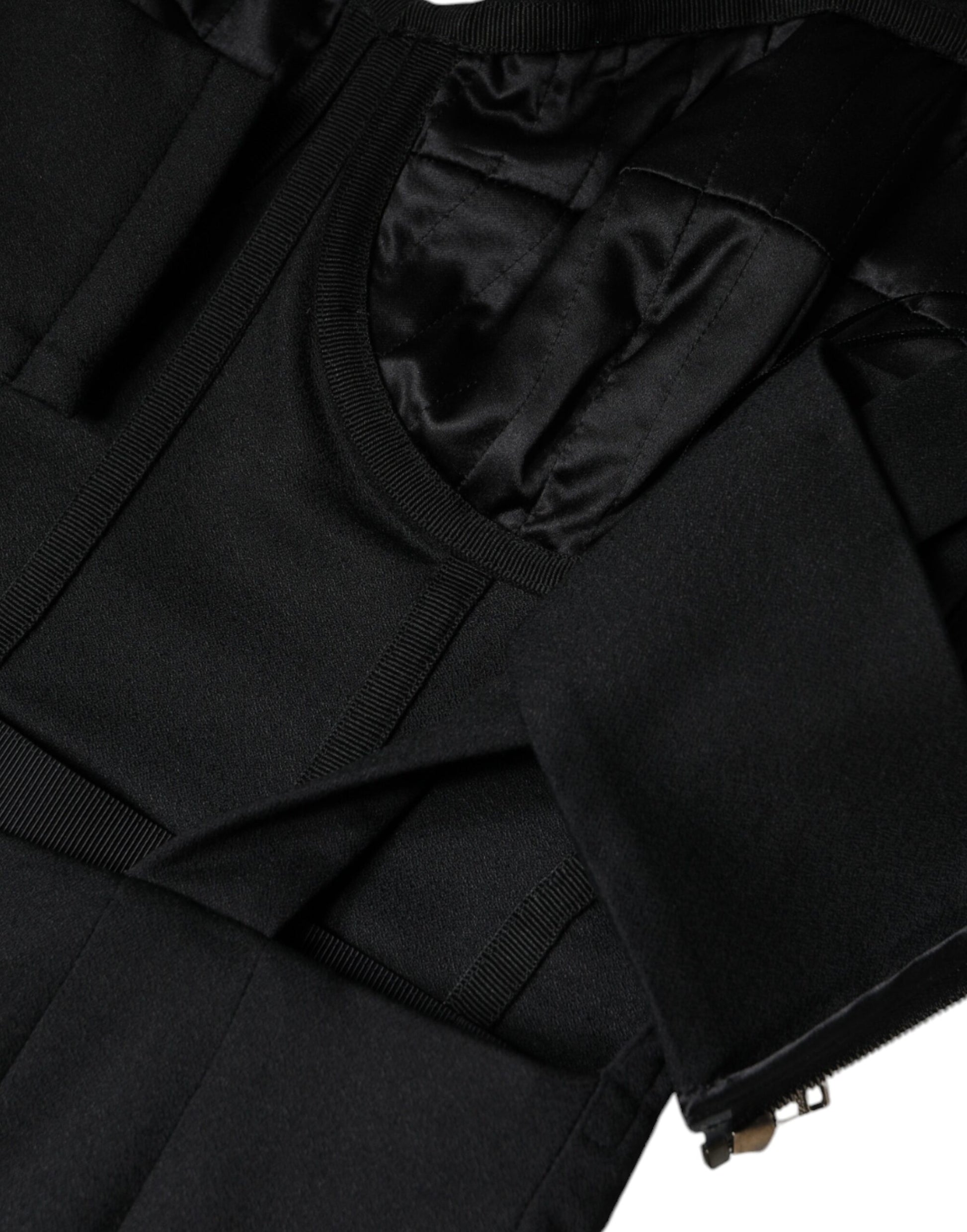 A black cut out sleeveless bodycon mini dress by Dolce & Gabbana