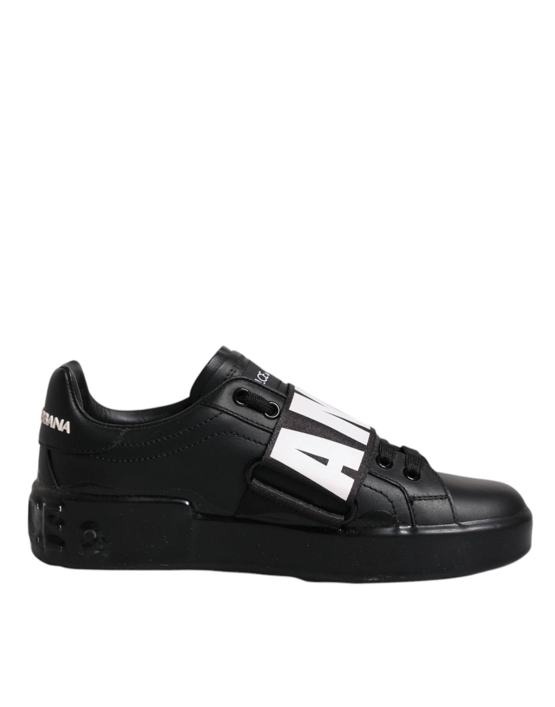 Black sneaker with white stripe and laces
