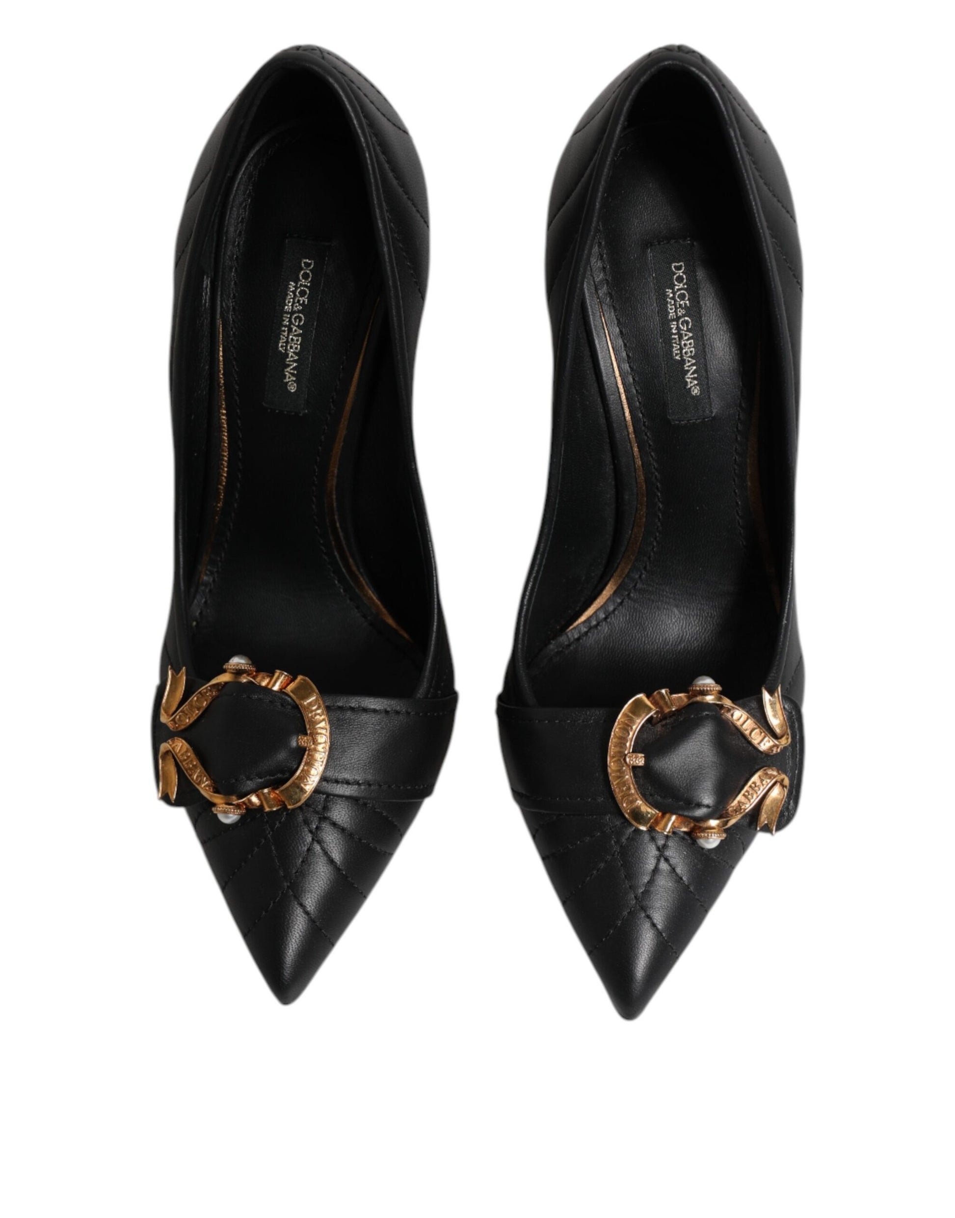 Black heeled shoes with gold accents