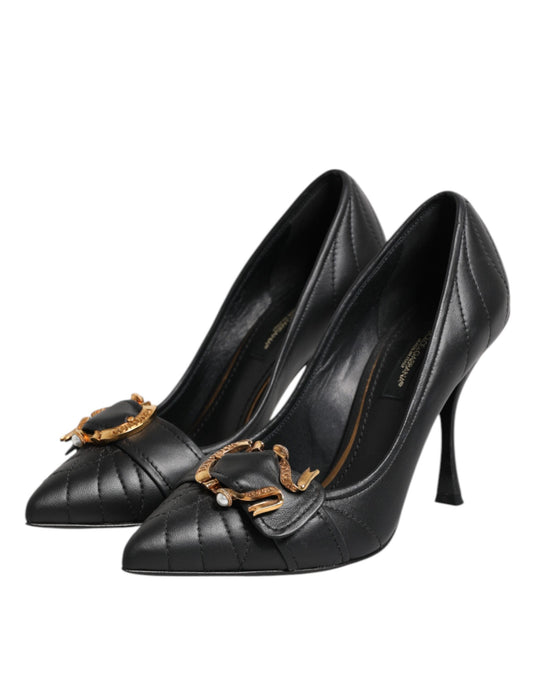 Black high heel shoes with gold accents