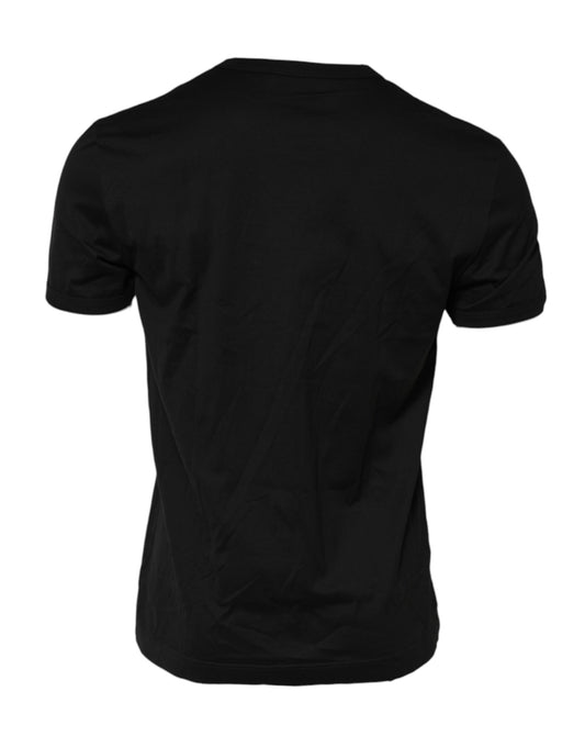Black t-shirt on a hanger