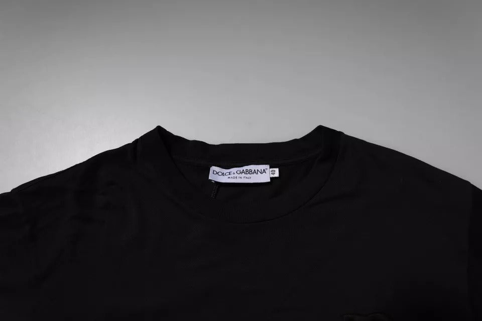 Black t-shirt on hanger