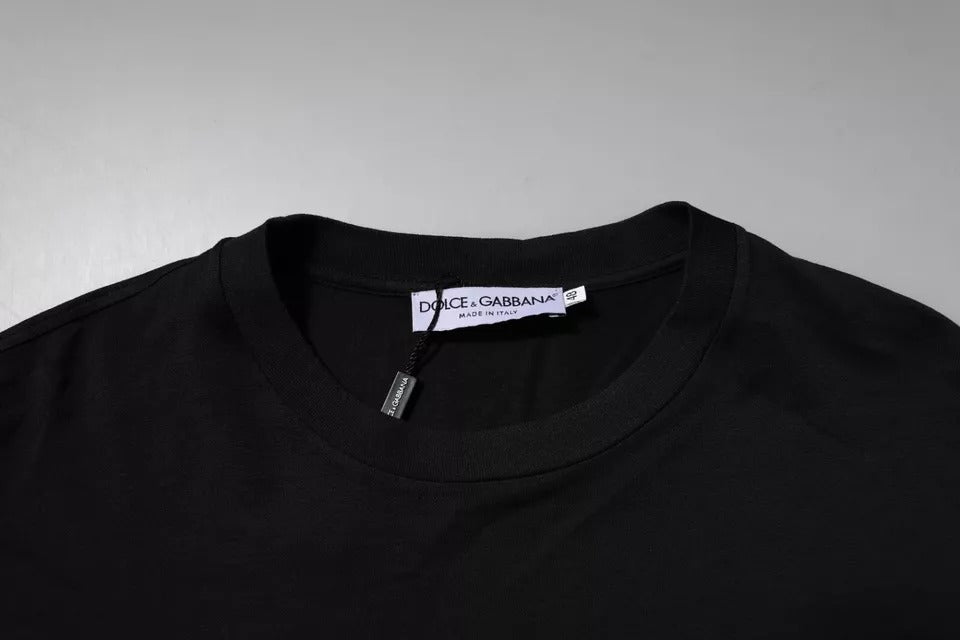 Black t-shirt on hanger