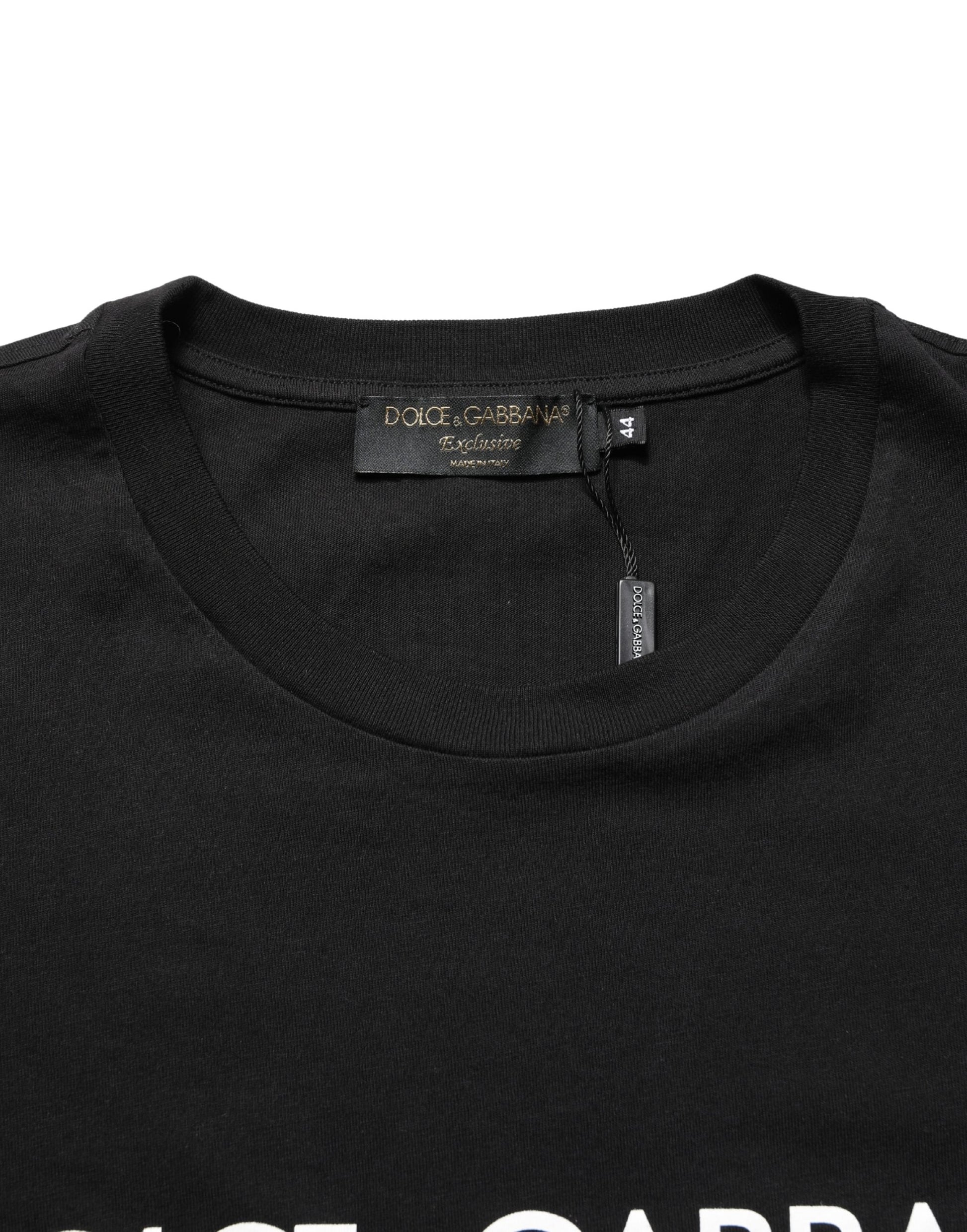 Black long sleeve shirt on hanger