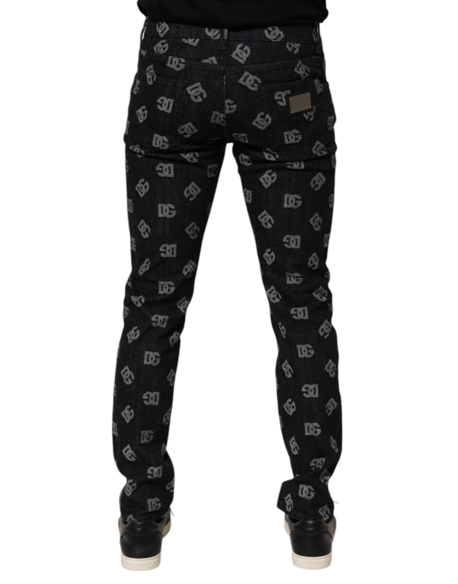 Pair of black pants with white patterned design on legs