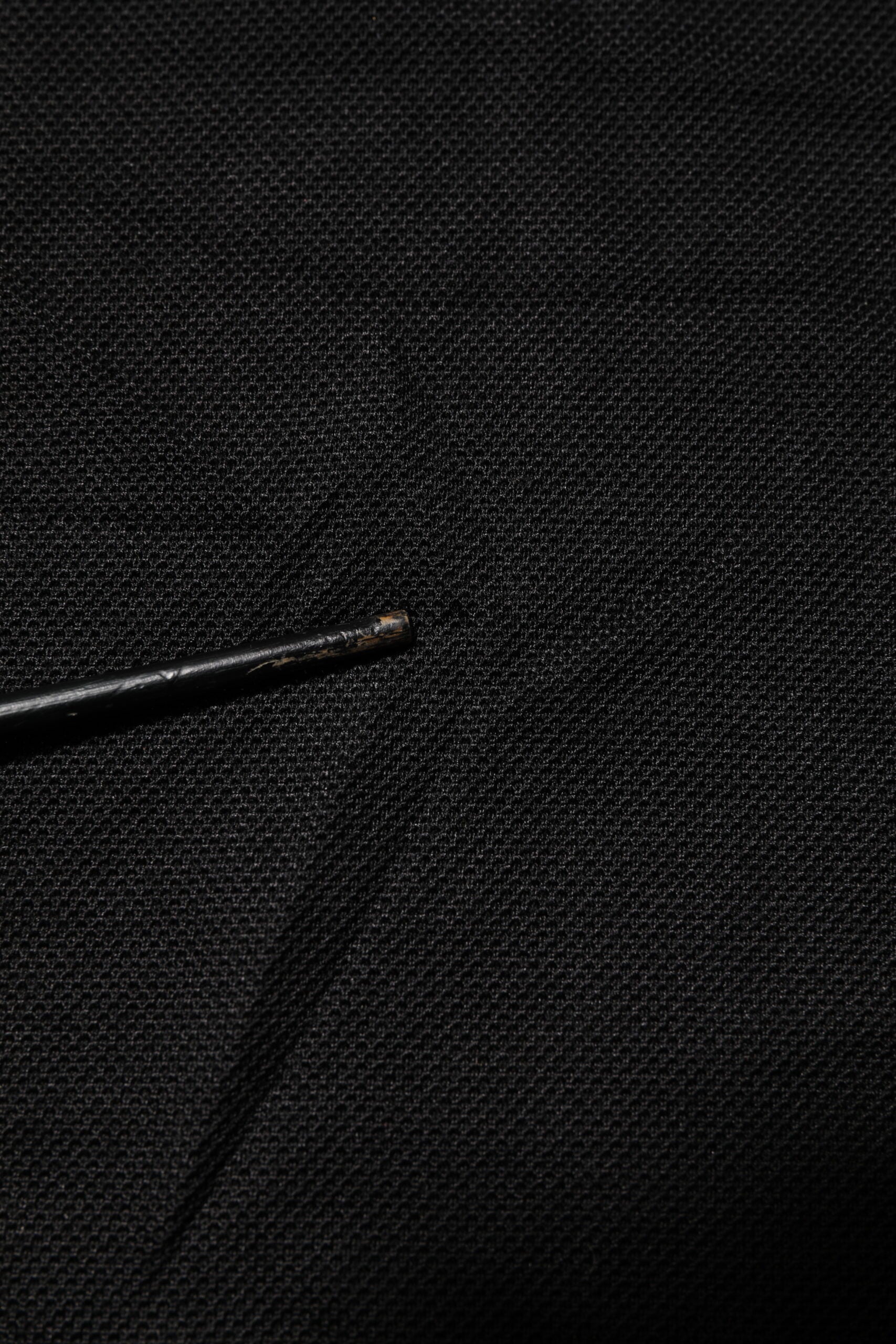 Black brush on black fabric