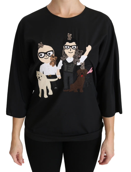 Black long sleeve sweater with cartoon dog and cat illustrations