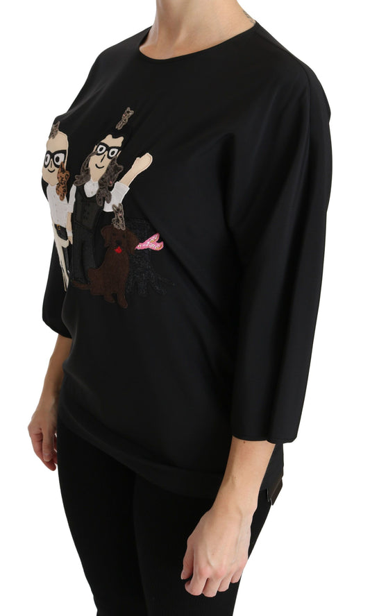 Black long sleeve shirt with graphic design on front