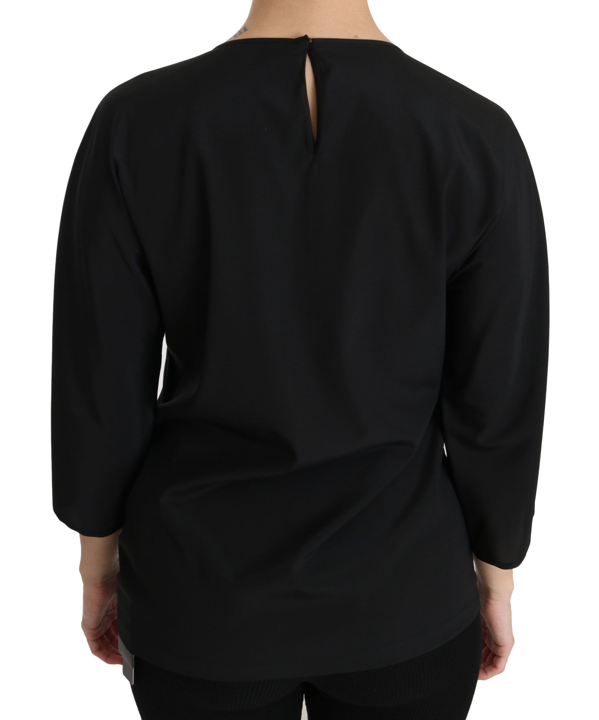 Black long sleeve shirt on a mannequin
