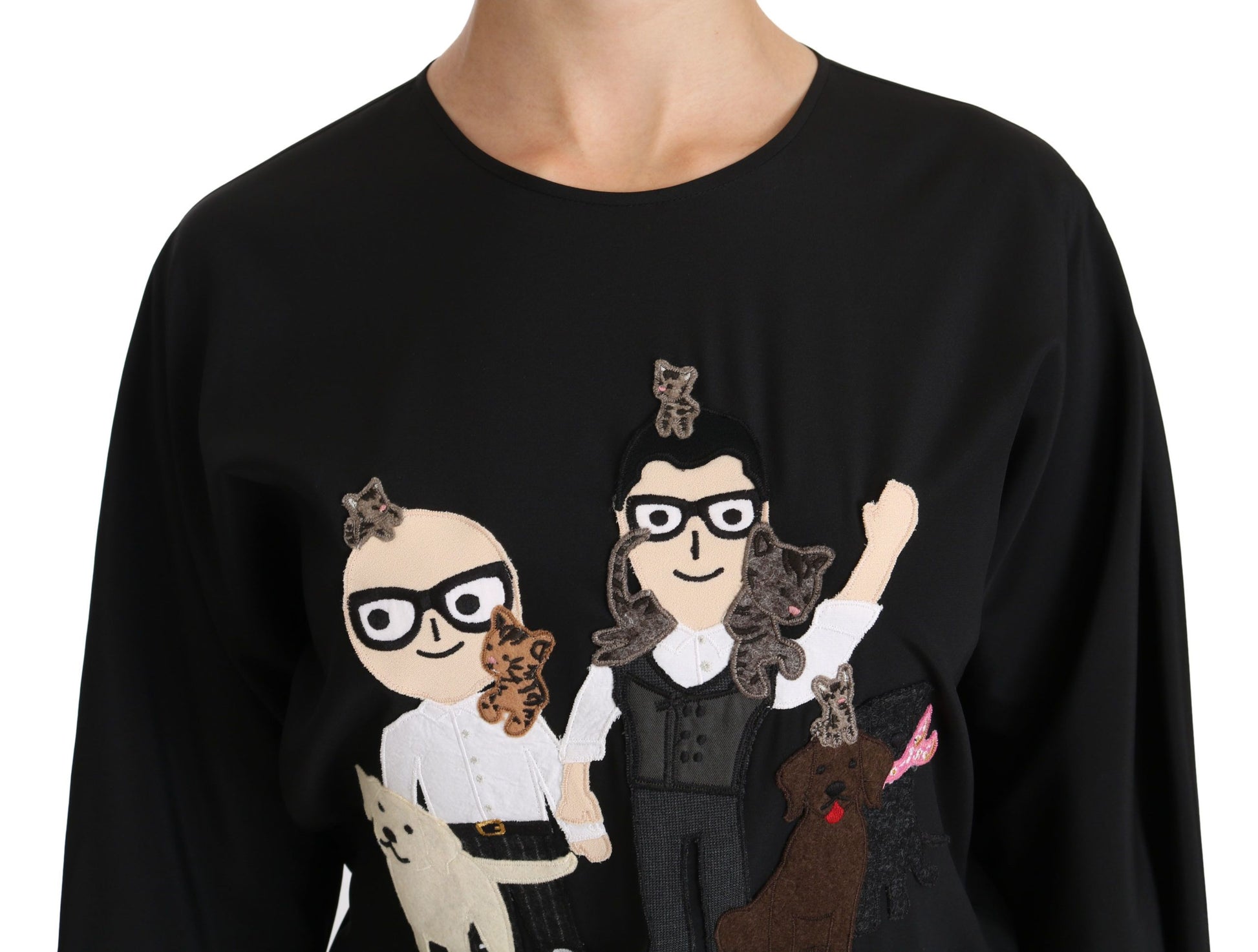 Sweater with cartoon characters embroidered on front