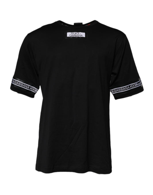 Black short sleeve t-shirt with white design on front