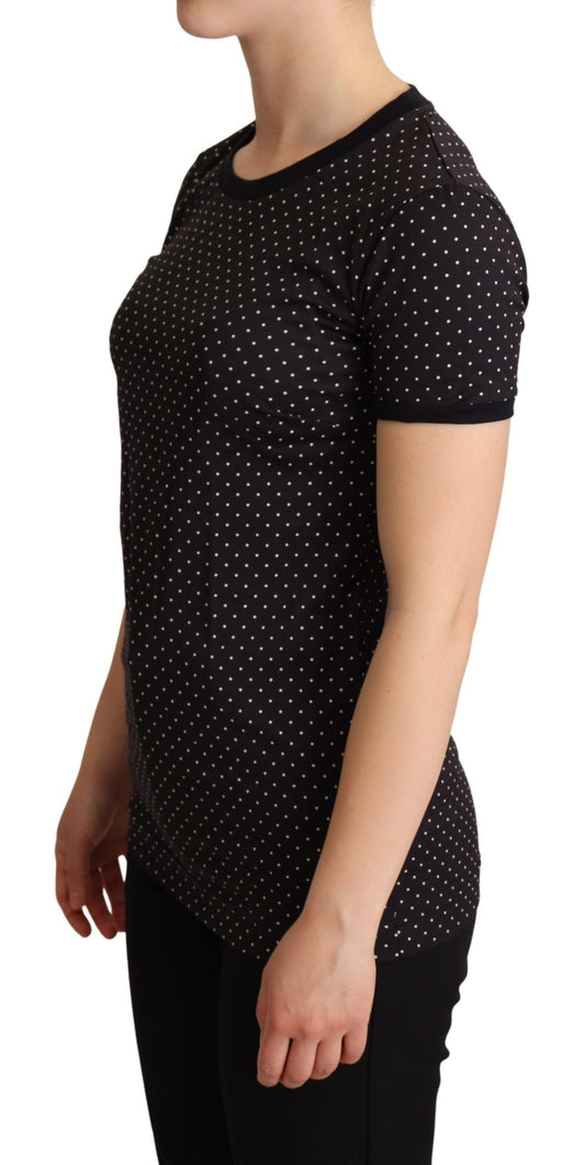 Black short sleeve polka dot shirt on a woman