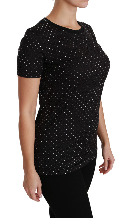 Black polka dot short sleeve shirt on woman